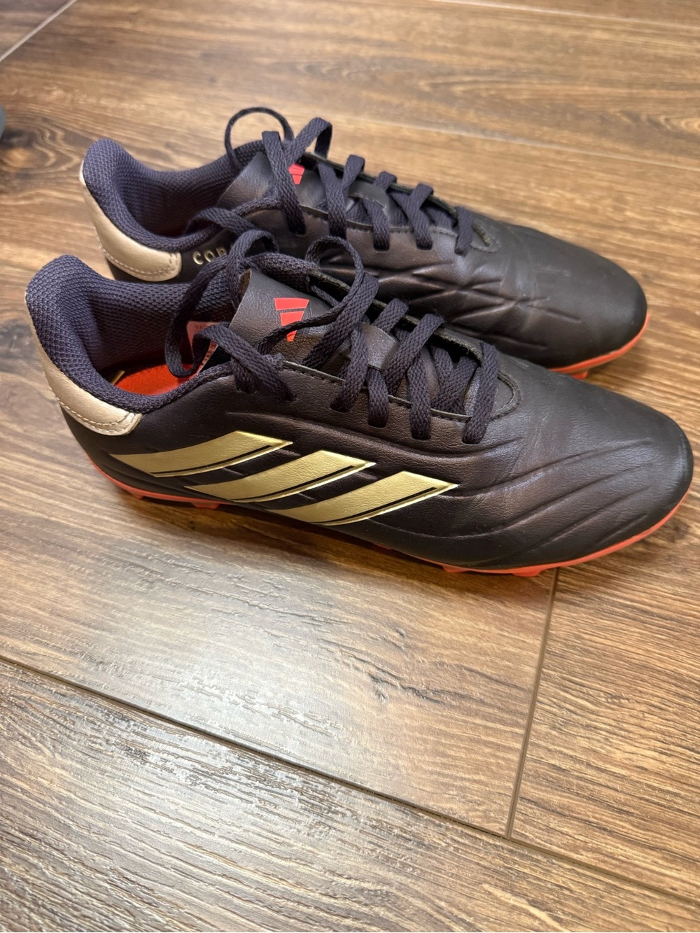 adidas Black Athletic Shoes with Red Interior and White Stripes
